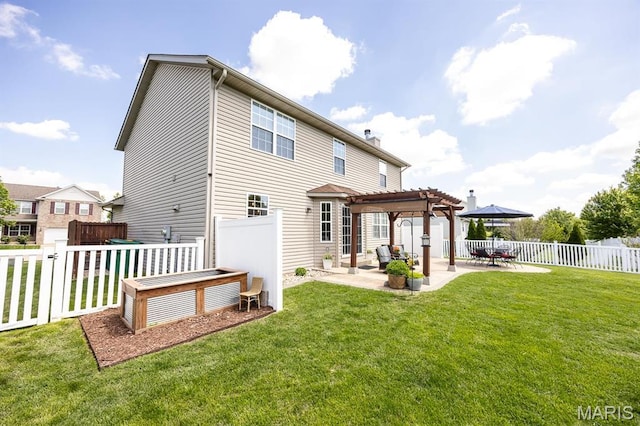 back of property featuring a pergola and a patio area