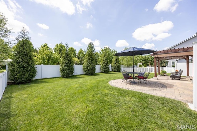 view of yard with a pergola and a patio area