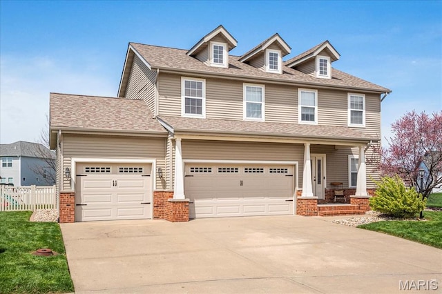 6 Bradley Ct, Troy, IL 62294 - view of front of property with concrete driveway, fence, and brick siding