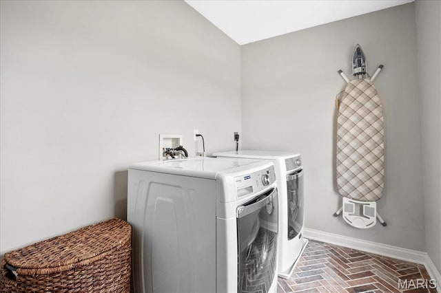 6 Bradley Ct, Troy, IL 62294 - washroom featuring washing machine and dryer, brick flooring, and baseboards