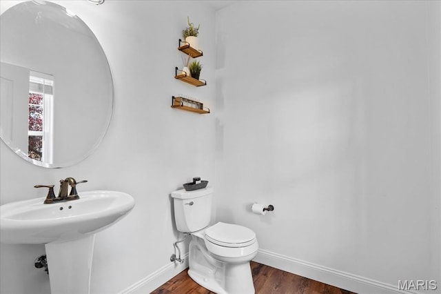 6 Bradley Ct, Troy, IL 62294 - bathroom featuring baseboards, toilet, and wood finished floors