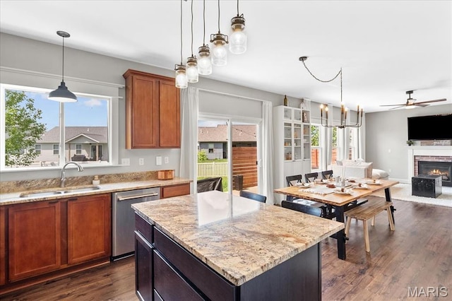 6 Bradley Ct, Troy, IL 62294 - kitchen with a sink, stainless steel dishwasher, healthy amount of natural light, and a brick fireplace