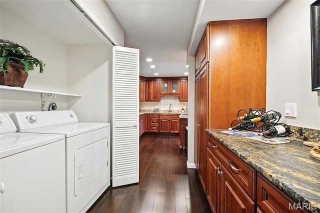 585 Coeur De Royale Dr Unit 203, Creve Coeur, MO 63141 - washroom featuring dark wood-type flooring, washing machine and dryer, and recessed lighting