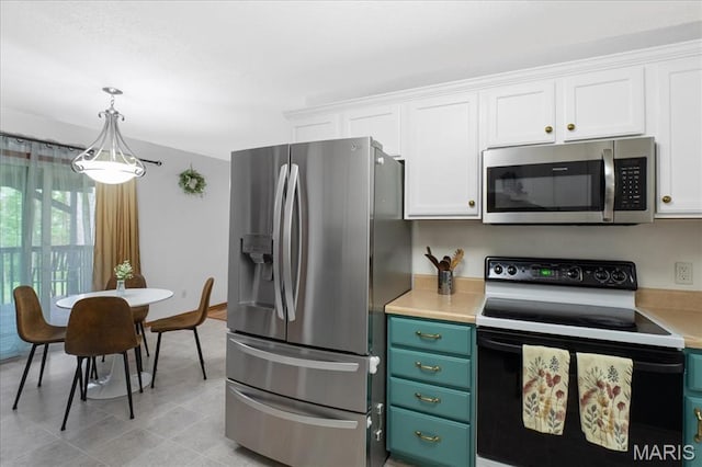 1138 Illini Dr, Ofallon, IL 62269 - kitchen with appliances with stainless steel finishes, white cabinetry, light countertops, and pendant lighting