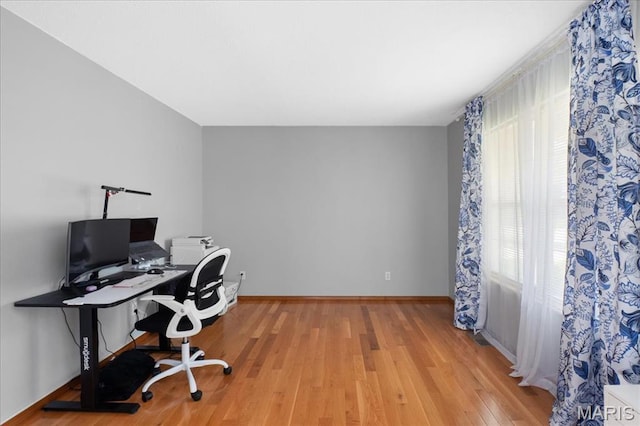 1138 Illini Dr, Ofallon, IL 62269 - office area featuring light wood finished floors and baseboards