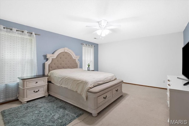 1138 Illini Dr, Ofallon, IL 62269 - bedroom featuring light colored carpet, a ceiling fan, and baseboards