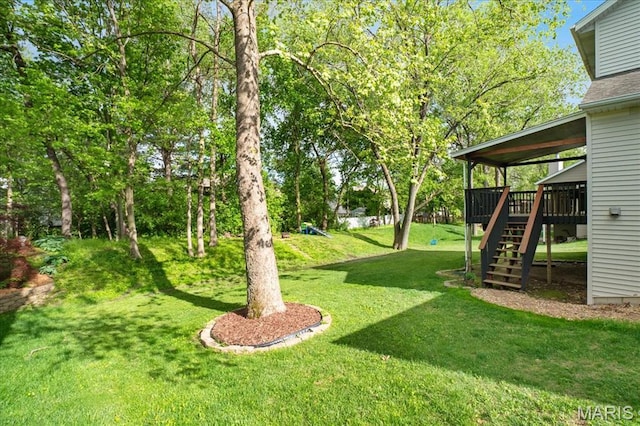 1138 Illini Dr, Ofallon, IL 62269 - view of grassy yard featuring stairs and a wooden deck