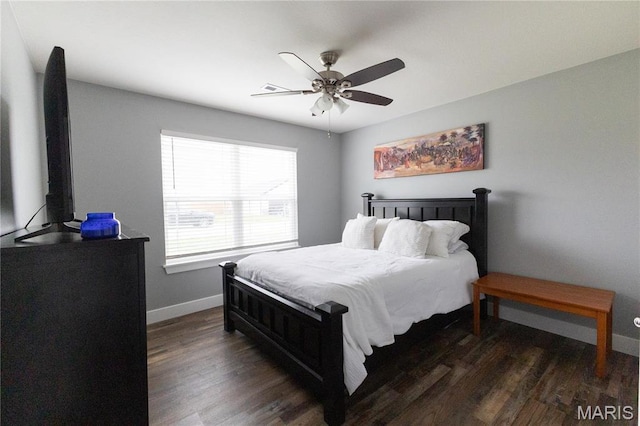 159 Mesa Dr, Waynesville, MO 65583 - bedroom with baseboards, wood finished floors, and ceiling fan