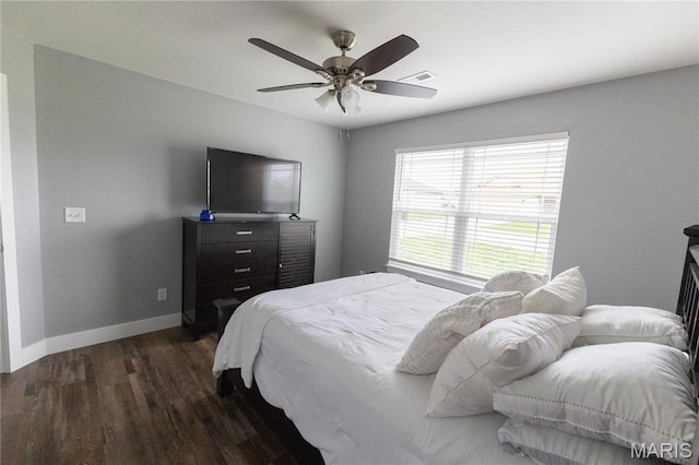 159 Mesa Dr, Waynesville, MO 65583 - bedroom with dark wood-type flooring, baseboards, and a ceiling fan