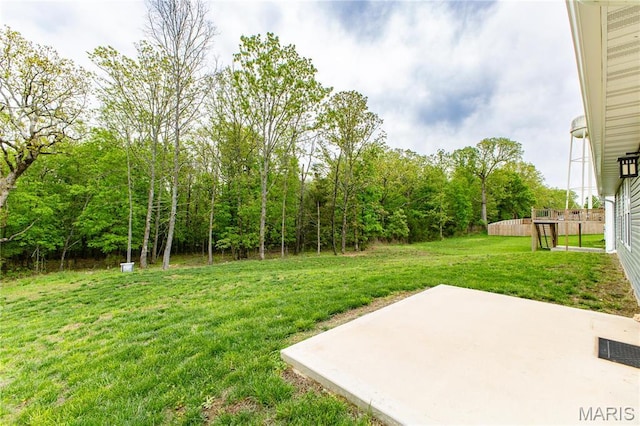 159 Mesa Dr, Waynesville, MO 65583 - view of green lawn featuring a patio area