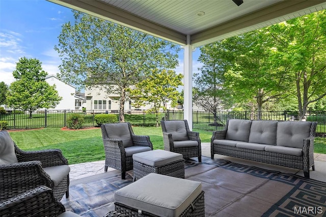 view of patio with outdoor lounge area and ceiling fan