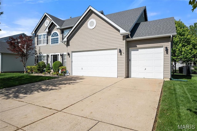 view of front of house featuring concrete driveway, an attached garage, a front lawn, and a shingled roof