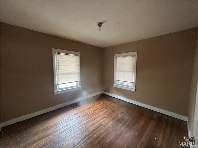 9969 Lark Ave, Saint Louis, MO 63125 - empty room featuring hardwood / wood-style flooring and plenty of natural light
