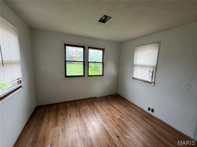 9969 Lark Ave, Saint Louis, MO 63125 - empty room featuring wood finished floors