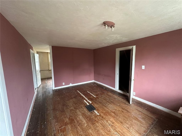 9969 Lark Ave, Saint Louis, MO 63125 - empty room featuring hardwood / wood-style floors and baseboards