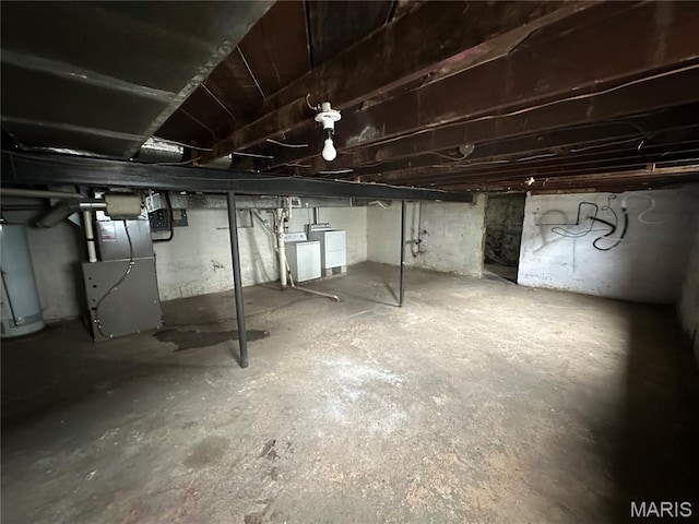9969 Lark Ave, Saint Louis, MO 63125 - unfinished basement featuring heating unit and water heater