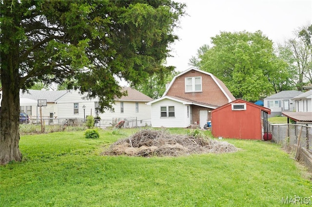 9969 Lark Ave, Saint Louis, MO 63125 - rear view of property with a fenced backyard and a shed