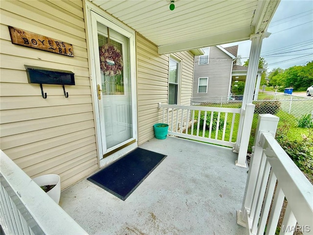 815 Stewart St, De Soto, MO 63020 - view of exterior entry featuring covered porch