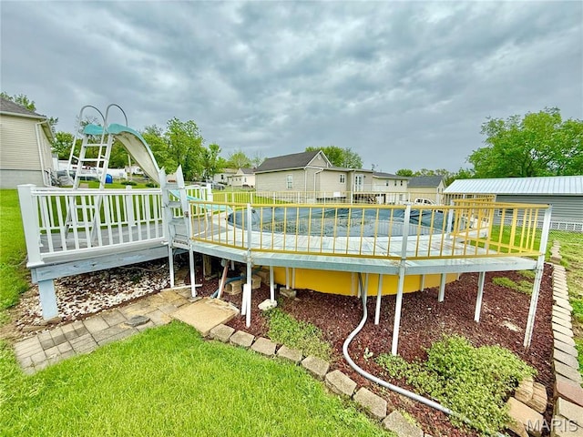815 Stewart St, De Soto, MO 63020 - view of swimming pool featuring a deck and a residential view