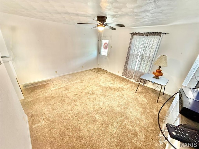 815 Stewart St, De Soto, MO 63020 - unfurnished room featuring carpet floors, a ceiling fan, and baseboards