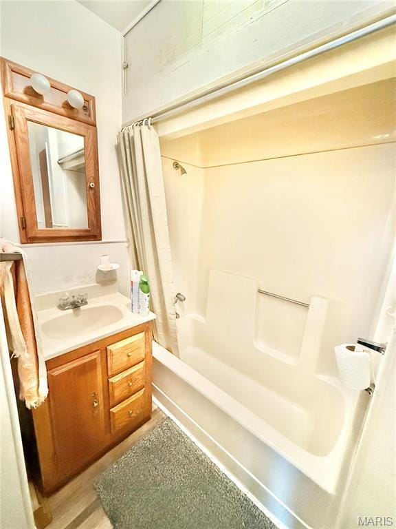 815 Stewart St, De Soto, MO 63020 - bathroom featuring vanity and shower / bath combination with curtain
