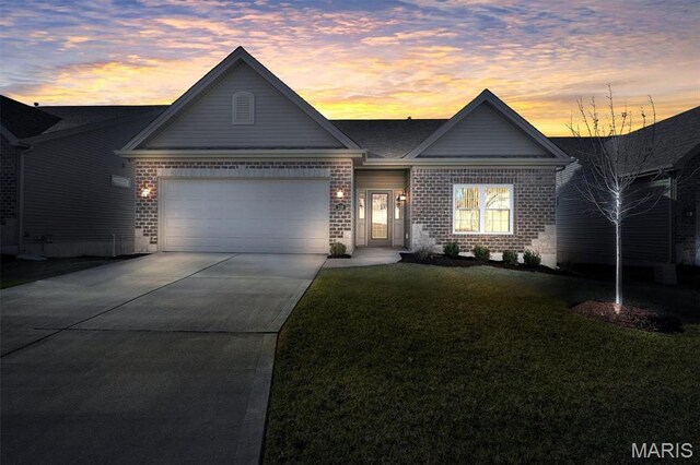 116 Dardenne Place Dr, Dardenne Prairie, MO 63368 - view of front of home featuring brick siding, an attached garage, concrete driveway, and a front lawn