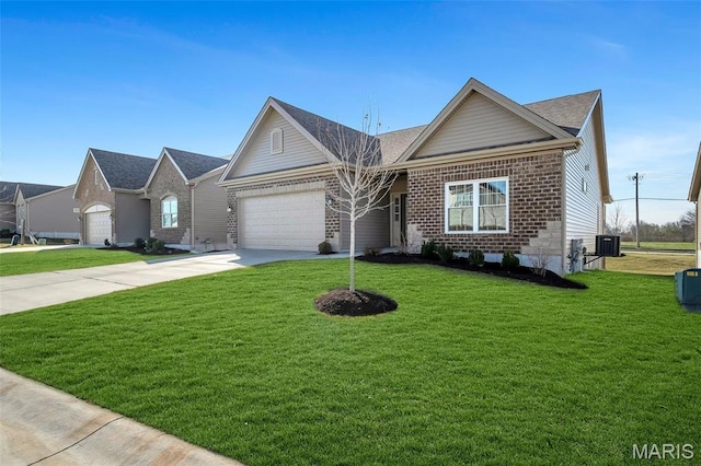 116 Dardenne Place Dr, Dardenne Prairie, MO 63368 - view of front of house with an attached garage, brick siding, concrete driveway, a front lawn, and cooling unit