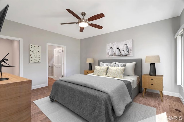 116 Dardenne Place Dr, Dardenne Prairie, MO 63368 - bedroom with baseboards, wood finished floors, and ceiling fan