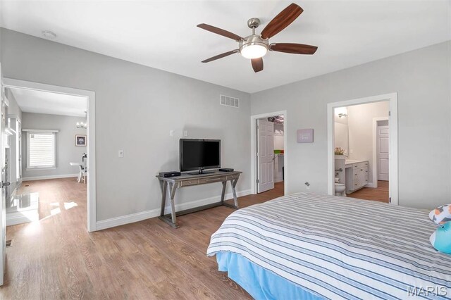 116 Dardenne Place Dr, Dardenne Prairie, MO 63368 - bedroom with wood finished floors, baseboards, a chandelier, and ceiling fan