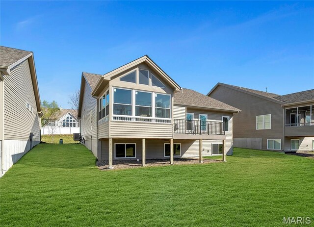 116 Dardenne Place Dr, Dardenne Prairie, MO 63368 - rear view of property featuring a yard, a wooden deck, a sunroom, and central air condition unit