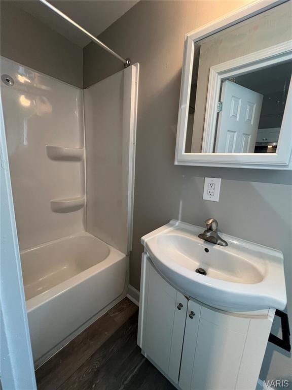 8423 Tennessee Ave, Saint Louis, MO 63125 - full bath with wood finished floors, shower / bathtub combination, and vanity