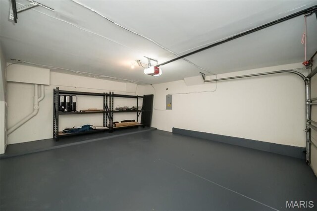 1040 Carroll St Unit 6, Saint Louis, MO 63104 - garage with a garage door opener and electric panel