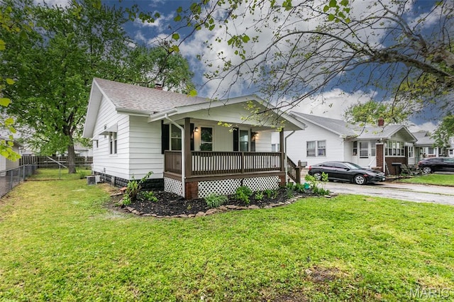 514 Hamilton Ave, Wood River, IL 62095 - view of front facade with covered porch, roof with shingles, and driveway