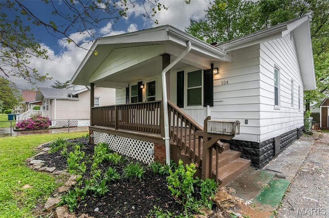 514 Hamilton Ave, Wood River, IL 62095 - view of front of house with covered porch and fence