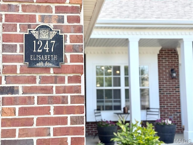 1247 Elisabeth Dr, Ofallon, IL 62269 - view of exterior entry with brick siding and roof with shingles