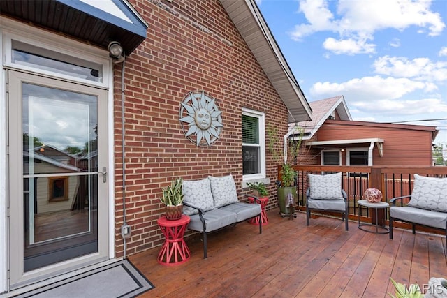wooden deck featuring an outdoor hangout area