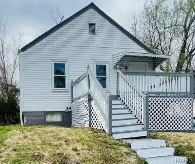 2123 Rosebud Ave, Hillsdale, MO 63121 - rear view of property with a lawn and a deck