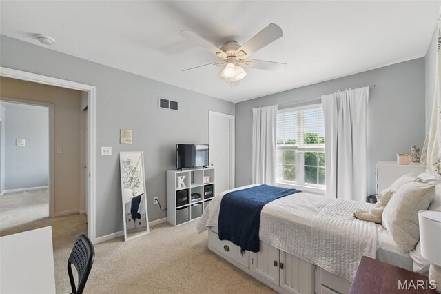 65 Snowberry Ridge Ct, Ofallon, MO 63366 - bedroom featuring light carpet, baseboards, and ceiling fan