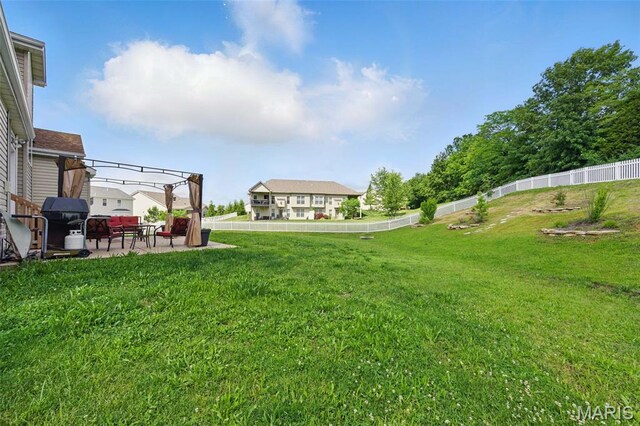 65 Snowberry Ridge Ct, Ofallon, MO 63366 - view of yard featuring a patio area