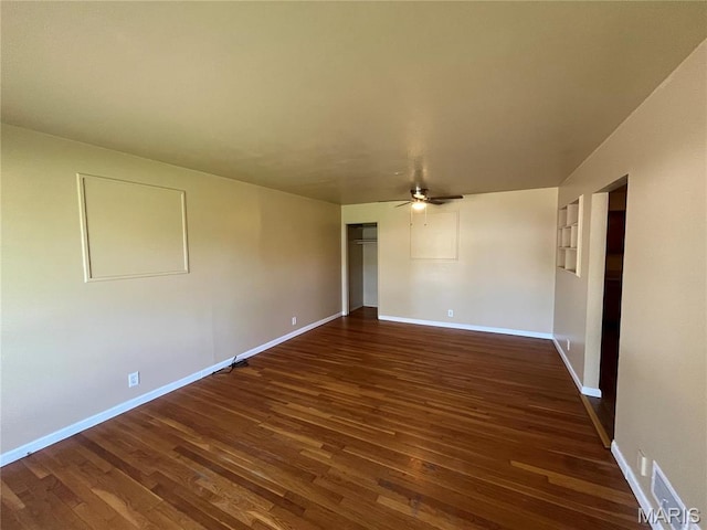 1688 Maldon Ln, Saint Louis, MO 63136 - empty room with wood finished floors, a ceiling fan, and baseboards