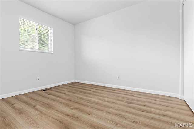 3401 Droste Rd, Saint Charles, MO 63301 - unfurnished room featuring light wood-style floors and baseboards