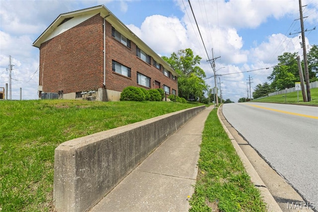 3401 Droste Rd, Saint Charles, MO 63301 - view of asphalt street with street lighting, sidewalks, and curbs