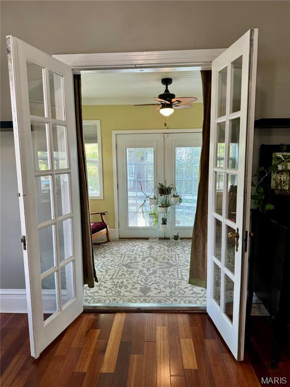 149 N Elizabeth Ave, Saint Louis, MO 63135 - doorway with french doors, ceiling fan, wood finished floors, and plenty of natural light