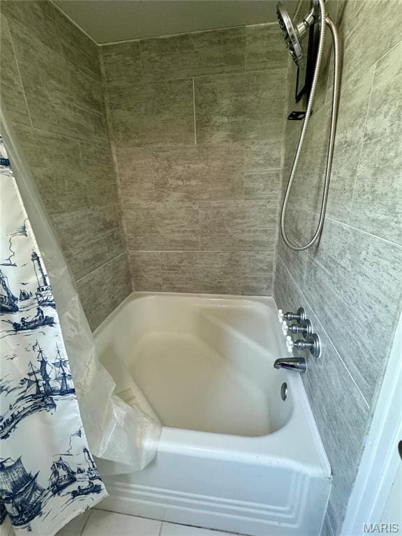 149 N Elizabeth Ave, Saint Louis, MO 63135 - bathroom featuring shower / bath combination with curtain and tile patterned floors