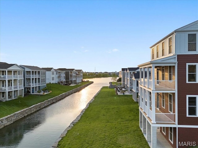 2032 Tiber St, Saint Charles, MO 63301 - view of community with a water view, a residential view, and a lawn