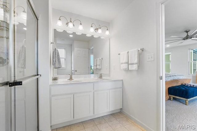 2032 Tiber St, Saint Charles, MO 63301 - bathroom featuring ensuite bathroom, baseboards, a shower with door, a ceiling fan, and double vanity
