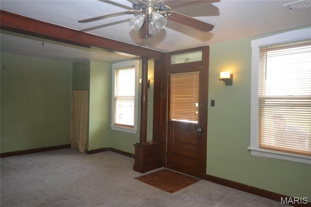 103 N Delaware Ave, Belleville, IL 62221 - entryway with carpet flooring, ceiling fan, baseboards, and ornate columns