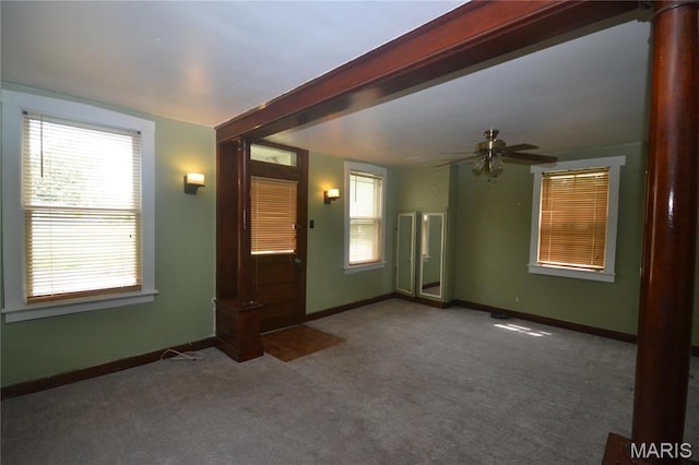 103 N Delaware Ave, Belleville, IL 62221 - carpeted empty room featuring baseboards and ceiling fan