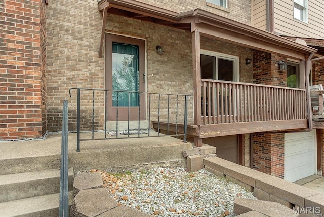 1811 Ramada Blvd Unit 6, Collinsville, IL 62234 - view of exterior entry with brick siding and an attached garage