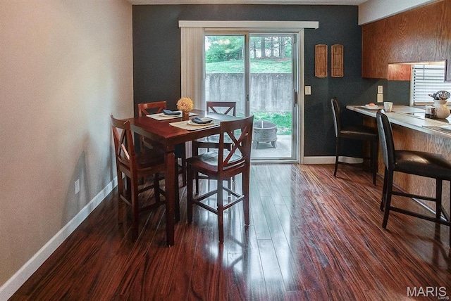 1811 Ramada Blvd Unit 6, Collinsville, IL 62234 - dining room with baseboards and dark wood finished floors
